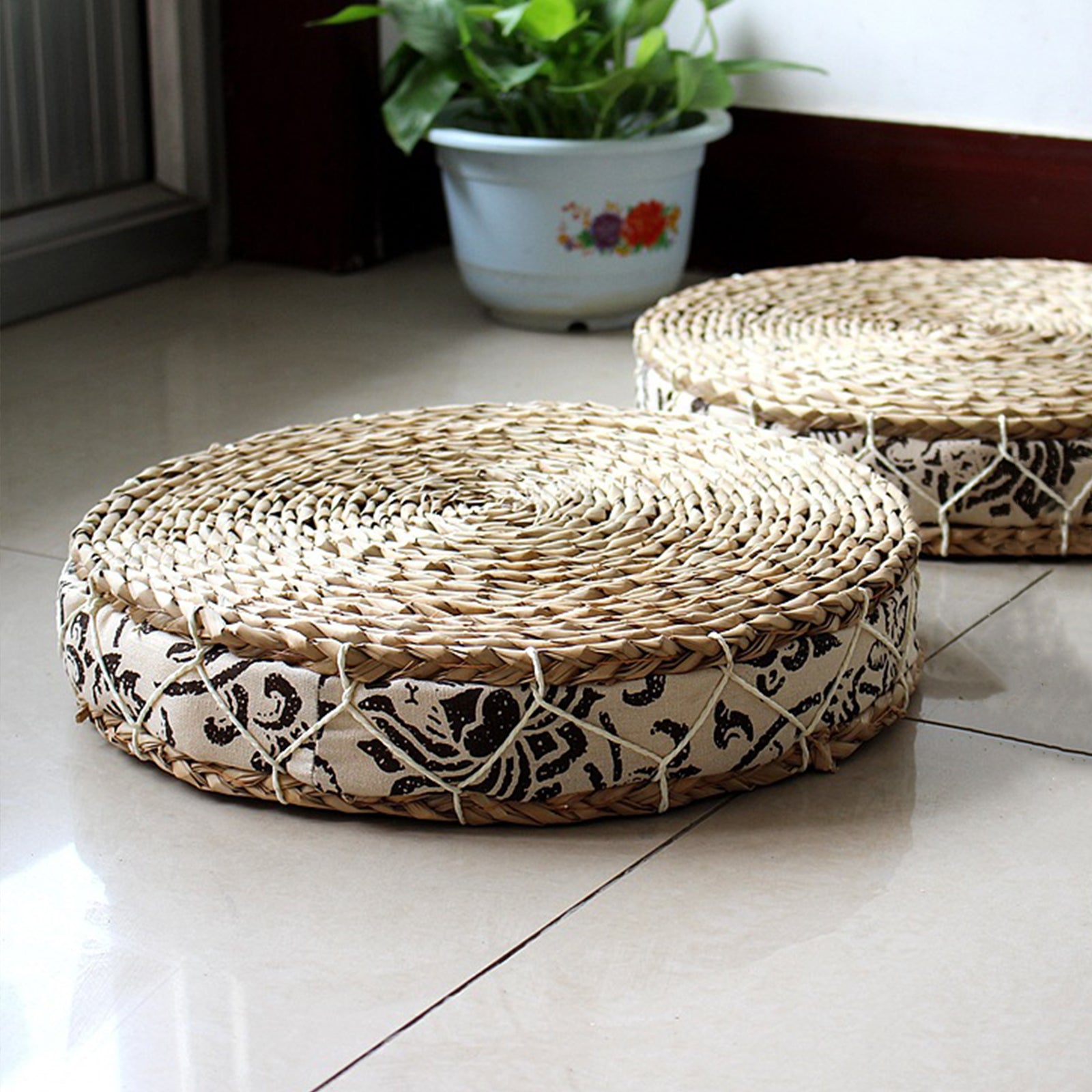 Coussin circulaire à motifs