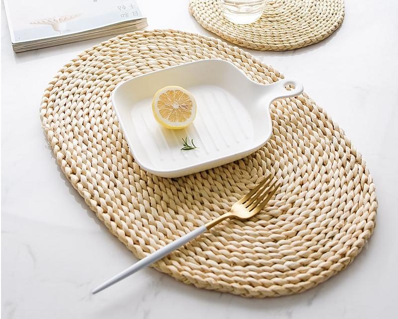 Dessous de plat ovale en rotin tissé