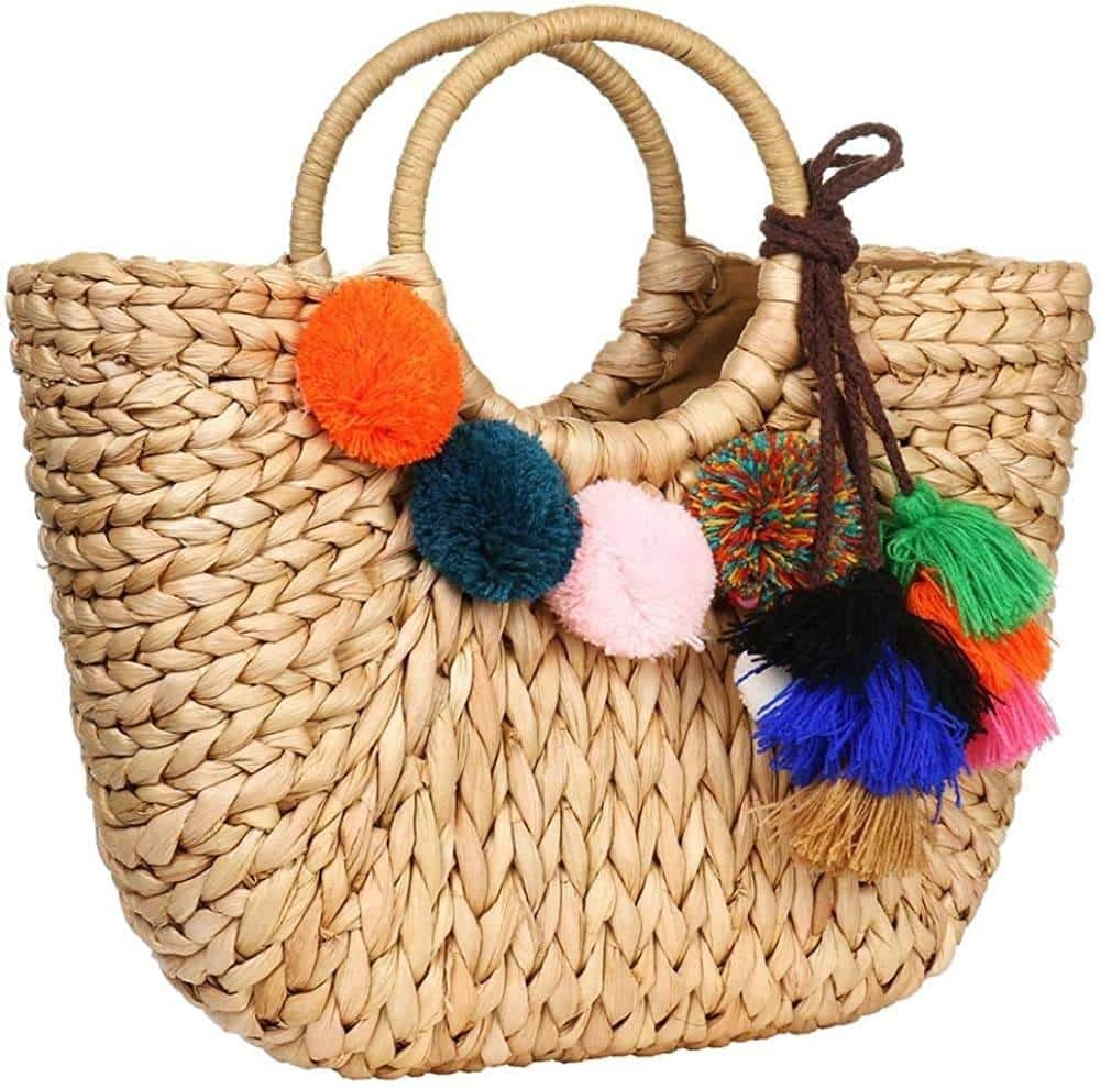Sac tissé style rotin à pompons