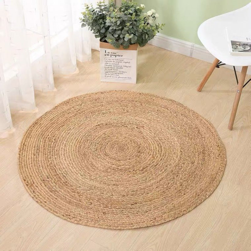 Tapis rond en rotin clair