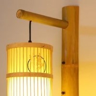 Applique murale en rotin cylindrique motifs asiatiques