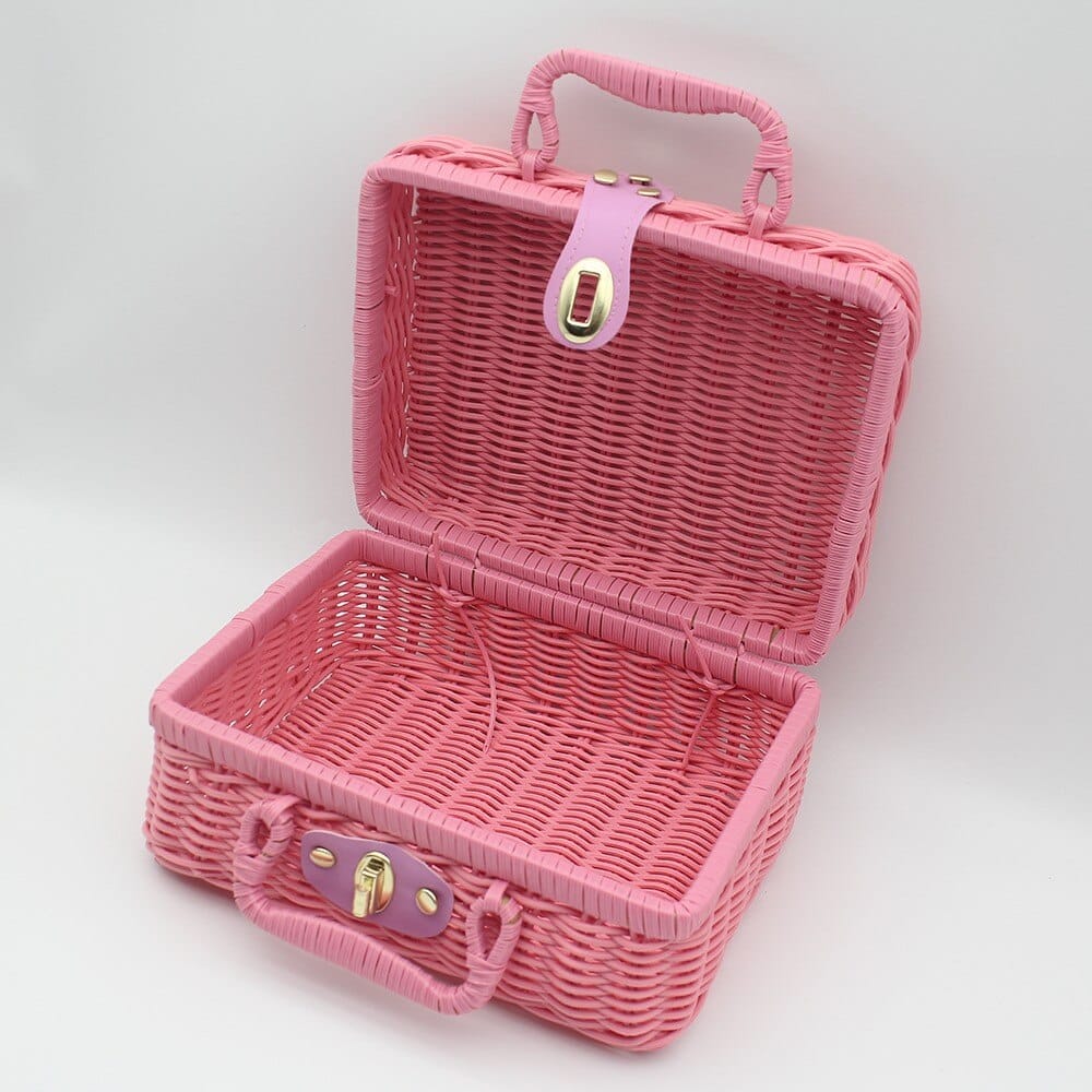 Coffre à jouet en rotin rose façon valise rétro