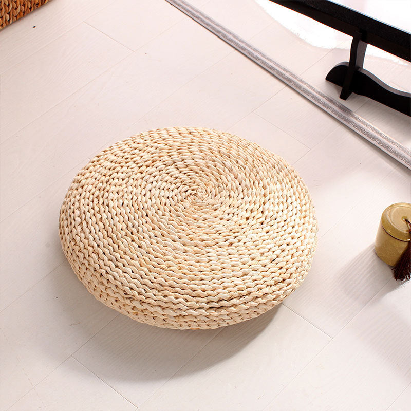 Coussin circulaire en rotin clair