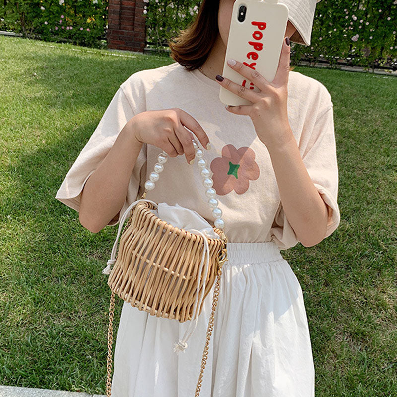 Sac à main en rotin tissé en forme de panier