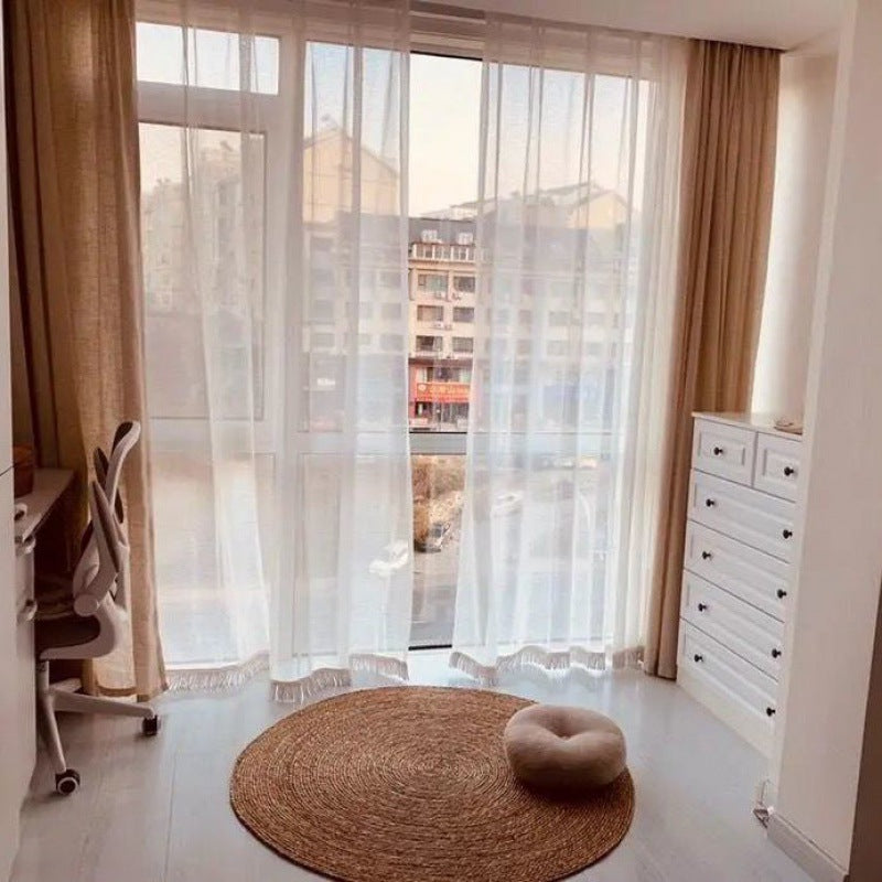 Tapis rond en rotin foncé