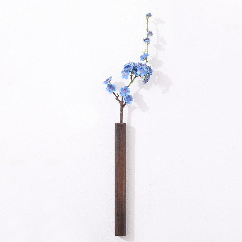 Vase mural en bois foncé