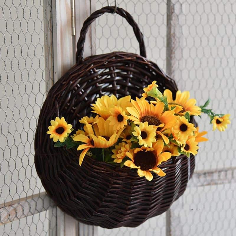 Vase mural en rotin suspendu